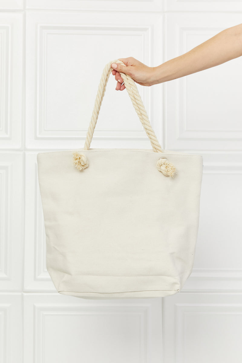 Bolso tote con borlas y fecha de picnic de Justin Taylor