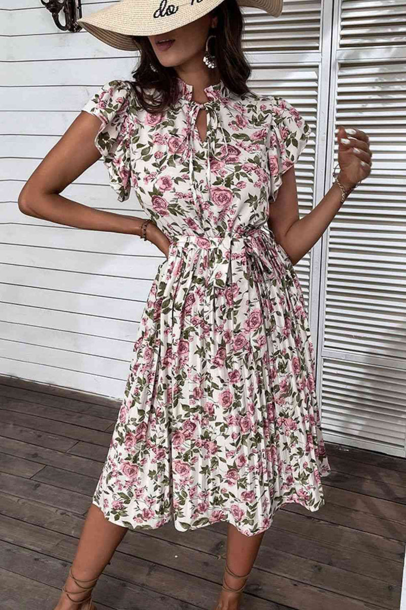 Vestido midi con estampado floral y mangas acampanadas