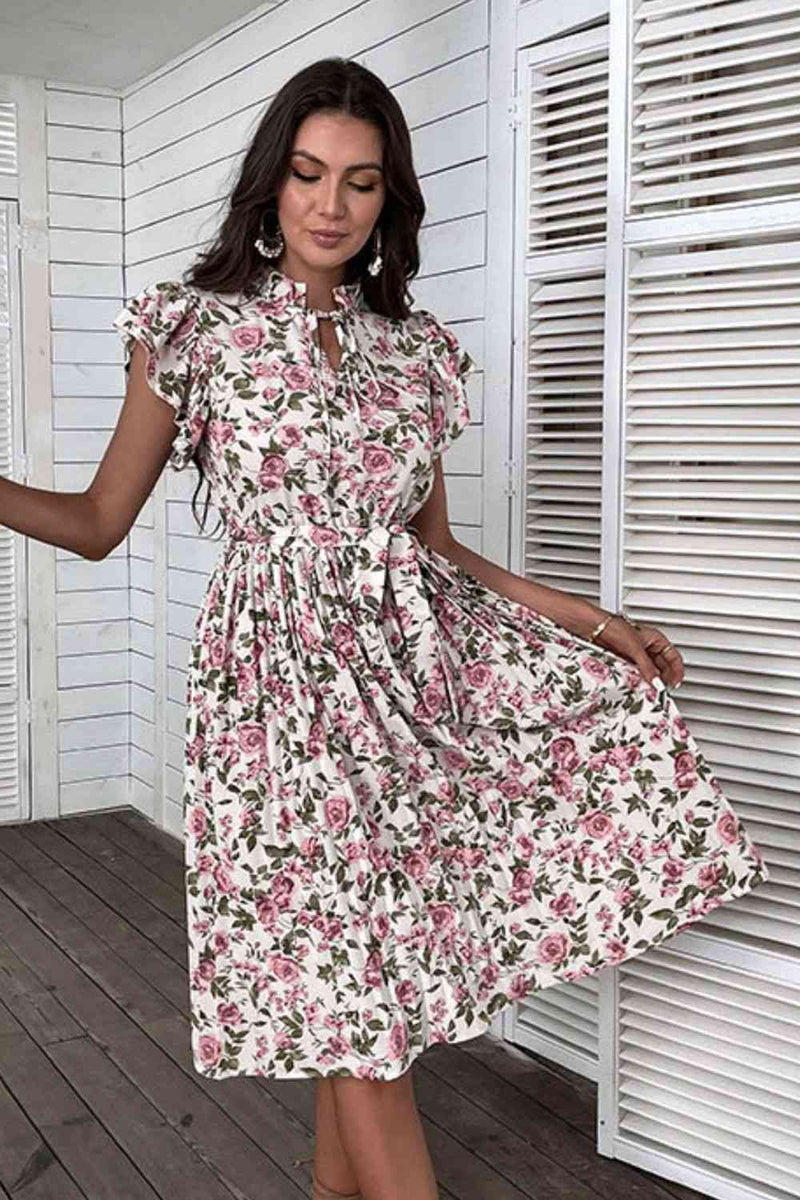 Vestido midi con estampado floral y mangas acampanadas